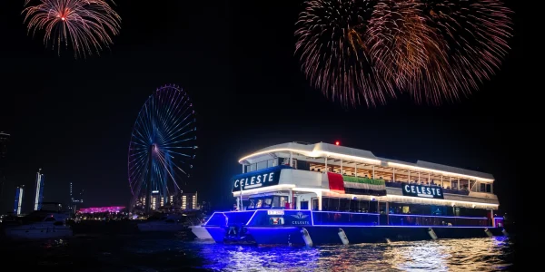 Night view of Dubai Marina from premium dinner cruise yacht